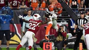 GLENDALE, AZ - NOVEMBER 22: Tight end Tyler Eifert #85 of the Cincinnati Bengals hauls in a first quarter touchdown pass over safety Tony Jefferson #22 of the Arizona Cardinals during the NFL game at University of Phoenix Stadium on November 22, 2015 in Glendale, Arizona. (Photo by Norm Hall/Getty Images)