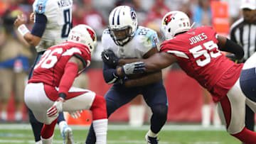 GLENDALE, AZ - DECEMBER 10: Derrick Henry #22 of the Tennessee Titans runs with the football against Budda Baker #36 and Chandler Jones #55 of the Arizona Cardinals at University of Phoenix Stadium on December 10, 2017 in Glendale, Arizona. (Photo by Christian Petersen/Getty Images)