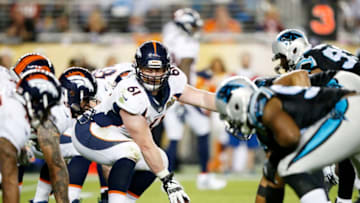 SANTA CLARA, CA - FEBRUARY 07: Matt Paradis #61 of the Denver Broncos prepares to hike the ball against the Carolina Panthers in the fourth quarter during Super Bowl 50 at Levi's Stadium on February 7, 2016 in Santa Clara, California. (Photo by Ezra Shaw/Getty Images)