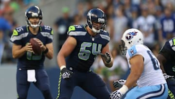 SEATTLE, WA - AUGUST 11: Guard J.R. Sweezy #64 of the Seattle Seahawks pass blocks against the Tennessee Titans at CenturyLink Field on August 11, 2012 in Seattle, Washington. (Photo by Otto Greule Jr/Getty Images)