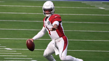 Jan 3, 2021; Inglewood, California, USA; Arizona Cardinals quarterback Kyler Murray (1) scrambles out of the pocket during the first quarter against the Los Angeles Rams at SoFi Stadium. Mandatory Credit: Robert Hanashiro-USA TODAY Sports
