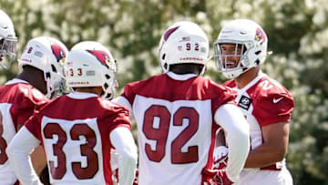 Zaven Collins, far right, was the Arizona Cardinals' first pick in last month's NFL Draft. Reports say the Cardinals have told starting linebacker Jordan Hicks that he can seek a trade, likely opening the door for Collins to start from Day 1.Syndication Arizona Republic