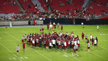 Jul 22, 2017; Glendale, AZ, USA; The Arizona Cardinals huddle during the opening day of training camp at University of Phoenix Stadium. Mandatory Credit: Rob Schumacher/azcentral sports via USA TODAY NETWORK