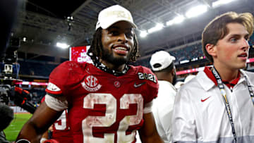 Jan 11, 2021; Miami Gardens, Florida, USA; Alabama Crimson Tide running back Najee Harris (22) celebrates after beating the Ohio State Buckeyes in the 2021 College Football Playoff National Championship Game. Mandatory Credit: Kim Klement-USA TODAY Sports
