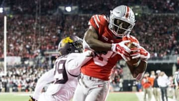 Nov 7, 2015; Columbus, OH, USA; Ohio State Buckeyes wide receiver Michael Thomas (3) catches a touchdown pass under pressure from Minnesota Golden Gophers defensive back Briean Boddy-Calhoun (29) at Ohio Stadium. Mandatory Credit: Greg Bartram-USA TODAY Sports