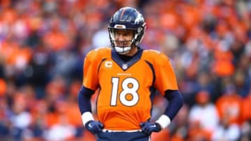 Jan 24, 2016; Denver, CO, USA; Denver Broncos quarterback Peyton Manning (18) against the New England Patriots in the AFC Championship football game at Sports Authority Field at Mile High. The Broncos defeated the Patriots 20-18 to advance to the Super Bowl. Mandatory Credit: Mark J. Rebilas-USA TODAY Sports