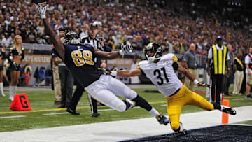 Sep 27, 2015; St. Louis, MO, USA; St. Louis Rams tight end Jared Cook (89) is unable to catch a pass in the end zone as Pittsburgh Steelers defensive back Ross Cockrell (31) defends during the second half at the Edward Jones Dome. Steelers defeated the Rams 12-6. Mandatory Credit: Jeff Curry-USA TODAY Sports