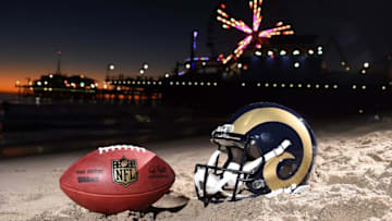 Feb 16, 2016; Los Angeles, CA, USA; General view of Los Angeles Rams helmet and NFL Wilson Duke football at the Santa Monica Pier. NFL owners voted 30-2 to allow owner Stan Kroenke (not pictured) to move the St. Louis Rams to Los Angeles for the 2016 season. Mandatory Credit: Kirby Lee-USA TODAY Sports
