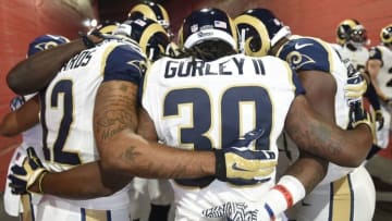 Aug 20, 2016; Los Angeles, CA, USA; Los Angeles Rams running back Todd Gurley (30) huddles with his team prior to the game against the Kansas City Chiefs at Los Angeles Memorial Coliseum. Mandatory Credit: Kelvin Kuo-USA TODAY Sports