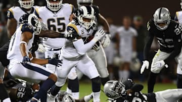 OAKLAND, CA - SEPTEMBER 10: Todd Gurley #30 of the Los Angeles Rams rushes with the ball against the Oakland Raiders during their NFL game at Oakland-Alameda County Coliseum on September 10, 2018 in Oakland, California. (Photo by Thearon W. Henderson/Getty Images)