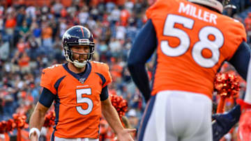 DENVER, CO - AUGUST 19: Quarterback Joe Flacco #5 of the Denver Broncos is greeted on the field by outside linebacker Von Miller #58 during player introductions before a preseason National Football League game against the San Francisco 49ers at Broncos Stadium at Mile High on August 19, 2019 in Denver, Colorado. (Photo by Dustin Bradford/Getty Images)