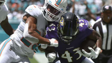 MIAMI, FL - SEPTEMBER 08: Minkah Fitzpatrick #29 of the Miami Dolphins knocks Justice Hill #43 of the Baltimore Ravens out of bounds during the first quarter of the game at Hard Rock Stadium on September 8, 2019 in Miami, Florida. (Photo by Eric Espada/Getty Images)
