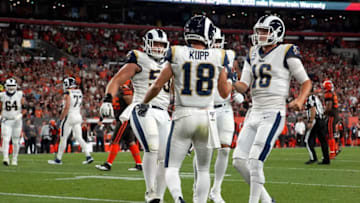 CLEVELAND, OH - SEPTEMBER 22: Cooper Kupp #18 of the Los Angeles Rams is congratulated by Jared Goff #16 after scoring a touchdown during the third quarter of the game agains the Cleveland Browns at FirstEnergy Stadium on September 22, 2019 in Cleveland, Ohio. Los Angeles defeated Cleveland 20-13. (Photo by Kirk Irwin/Getty Images)