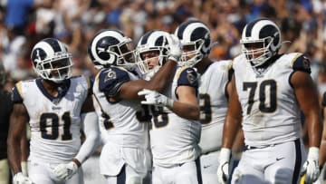 LOS ANGELES, CALIFORNIA - SEPTEMBER 15: Wide receiver Cooper Kupp #18 of the Los Angeles Rams celebrates with teammates during the fourth quarter against the New Orleans Saints at Los Angeles Memorial Coliseum on September 15, 2019 in Los Angeles, California. (Photo by Meg Oliphant/Getty Images)