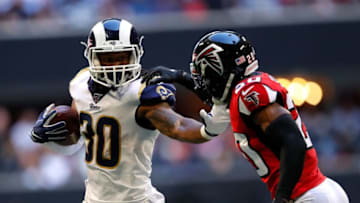 ATLANTA, GEORGIA - OCTOBER 20: Todd Gurley II #30 of the Los Angeles Rams rushes against Kendall Sheffield #20 of the Atlanta Falcons in the second half at Mercedes-Benz Stadium on October 20, 2019 in Atlanta, Georgia. (Photo by Kevin C. Cox/Getty Images)