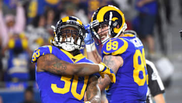 LOS ANGELES, CA - NOVEMBER 17: Tight end Tyler Higbee #89 looks on as running back Todd Gurley #30 of the Los Angeles Rams celebrates after a touchdown in the second quarter of the game against the Chicago Bears at the Los Angeles Memorial Coliseum on November 17, 2019 in Los Angeles, California. (Photo by Jayne Kamin-Oncea/Getty Images)