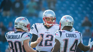 ORCHARD PARK, NY - DECEMBER 03: Tom Brady #12, Danny Amendola #80 and Brandin Cooks #14 of the New England Patriots shake hands before the game against the Buffalo Bills at New Era Field on December 3, 2017 in Orchard Park, New York. New England defeats Buffalo 23-3. (Photo by Brett Carlsen/Getty Images)