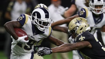 NEW ORLEANS, LA - AUGUST 30: JoJo Natson #19 of the Los Angeles Rams is tackled by Kam Moore #39 of the New Orleans Saints at Mercedes-Benz Superdome on August 30, 2018 in New Orleans, Louisiana. (Photo by Chris Graythen/Getty Images)