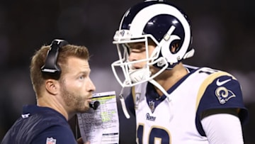 OAKLAND, CA - SEPTEMBER 10: Head coach Sean McVay of the Los Angeles Rams speaks with Jared Goff #16 their NFL game against the Oakland Raiders at Oakland-Alameda County Coliseum on September 10, 2018 in Oakland, California. (Photo by Ezra Shaw/Getty Images)