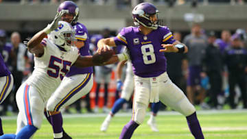 MINNEAPOLIS, MN - SEPTEMBER 23: Jerry Hughes #55 of the Buffalo Bills pursues Kirk Cousins #8 of the Minnesota Vikings as he passes the ball in the third quarter of the game at U.S. Bank Stadium on September 23, 2018 in Minneapolis, Minnesota. (Photo by Adam Bettcher/Getty Images)