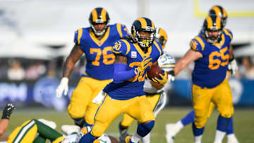 LOS ANGELES, CA - OCTOBER 28: Running back Todd Gurley #30 of the Los Angeles Rams breaks free in the fourth quarter against the Green Bay Packers at Los Angeles Memorial Coliseum on October 28, 2018 in Los Angeles, California. (Photo by John McCoy/Getty Images)