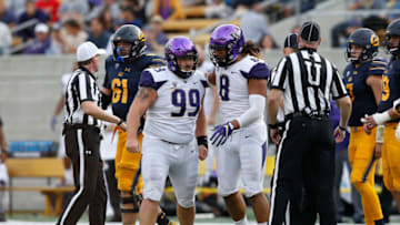 BERKELEY, CA - OCTOBER 27: Greg Gaines #99 and Benning Potoa'e #8 of the Washington Huskies celebrate after tackling quarterback Chase Garbers #7 of the California Golden Bears at California Memorial Stadium on October 27, 2018 in Berkeley, California. (Photo by Lachlan Cunningham/Getty Images)