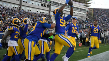 LOS ANGELES, CA - DECEMBER 30: Cory Littleton #58 of the Los Angeles Rams celebrates an interception returned for a touchdown against the San Francisco 49ers at Los Angeles Memorial Coliseum on December 30, 2018 in Los Angeles, California. (Photo by John McCoy/Getty Images)