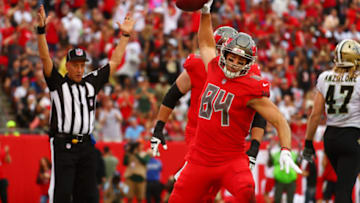 TAMPA, FLORIDA - DECEMBER 09: Cameron Brate #84 of the Tampa Bay Buccaneers spikes the ball after scoring a touchdown in the second quarter against the New Orleans Saints at Raymond James Stadium on December 09, 2018 in Tampa, Florida. (Photo by Will Vragovic/Getty Images)