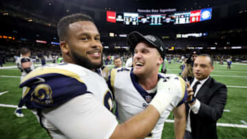 NEW ORLEANS, LOUISIANA - JANUARY 20: Aaron Donald #93 and Greg Zuerlein #4 of the Los Angeles Rams celebrate after defeating the New Orleans Saints in the NFC Championship game at the Mercedes-Benz Superdome on January 20, 2019 in New Orleans, Louisiana. The Los Angeles Rams defeated the New Orleans Saints with a score of 26 to 23. (Photo by Streeter Lecka/Getty Images)