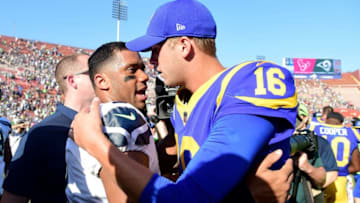 LOS ANGELES, CA - OCTOBER 08: Russell Wilson #3 of the Seattle Seahawks meets Jared Goff #16 of the Los Angeles Rams after a 16-10 Seahawks win at Los Angeles Memorial Coliseum on October 8, 2017 in Los Angeles, California. (Photo by Harry How/Getty Images)