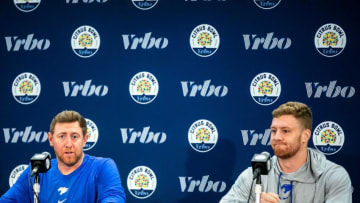 Kentucky offensive coordinator Liam Coen, left, speaks during a news conference with quarterback Will Levins for the Vrbo Citrus Bowl, Wednesday, Dec. 29, 2021, at the Rosen Plaza Hotel in Orlando, Fla.211229 Iowa Kentucky Presser 011 Jpg