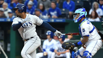 KANSAS CITY, MISSOURI - APRIL 29: Yandy Diaz #2 of the Tampa Bay Rays hits an RGI single in the first inning against the Kansas City Royals at Kauffman Stadium on April 29, 2019 in Kansas City, Missouri. (Photo by Ed Zurga/Getty Images)