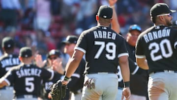 BOSTON, MA - JUNE 26: Jose Abreu #79 of the Chicago White Sox high fives teammates as he exits the field after a victory over the Boston Red Sox at Fenway Park on June 26, 2019 in Boston, Massachusetts. (Photo by Adam Glanzman/Getty Images)