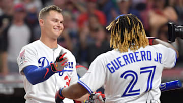 CLEVELAND, OHIO - JULY 08: Vladimir Guerrero Jr. of the Toronto Blue Jays reacts after knocking out Joc Pederson of the Los Angeles Dodgers in the T-Mobile Home Run Derby at Progressive Field on July 08, 2019 in Cleveland, Ohio. (Photo by Jason Miller/Getty Images)