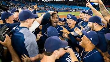 TORONTO, ONTARIO - SEPTEMBER 27: Tampa Bay Rays players celebrate clinching a wild card playoff spot after defeating the Toronto Blue Jays in their MLB game at the Rogers Centre on September 27, 2019 in Toronto, Canada. (Photo by Mark Blinch/Getty Images)