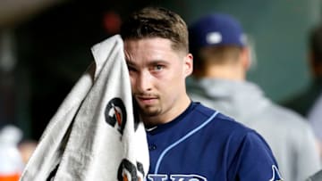 HOUSTON, TEXAS - OCTOBER 05: Blake Snell #4 of the Tampa Bay Rays wipes his face in the dug out after he was relieved in the fourth inning of Game 2 of the ALDS against the Houston Astros at Minute Maid Park on October 05, 2019 in Houston, Texas. (Photo by Tim Warner/Getty Images)