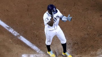 ARLINGTON, TEXAS - OCTOBER 23: Randy Arozarena #56 of the Tampa Bay Rays celebrates after hitting a solo home run against the Los Angeles Dodgers during the ninth inning in Game Three of the 2020 MLB World Series at Globe Life Field on October 23, 2020 in Arlington, Texas. (Photo by Sean M. Haffey/Getty Images)