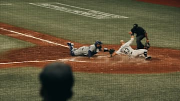 ST PETERSBURG, FLORIDA - APRIL 24: Mike Brosseau #43 of the Tampa Bay Rays attempts to take home against the Toronto Blue Jays in the eighth inning at Tropicana Field on April 24, 2021 in St Petersburg, Florida. (Photo by Harry Aaron/Getty Images)