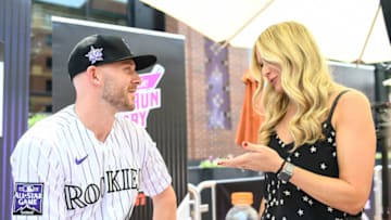 DENVER, CO - JULY 12: Trevor Story #27 of the Colorado Rockies talks to MLB Network reporter Heidi Watney during the Gatorade All-Star Workout Day outside of Coors Field on July 12, 2021 in Denver, Colorado. (Photo by Dustin Bradford/Getty Images)