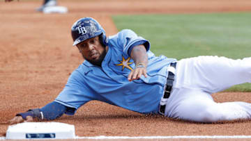 PORT CHARLOTTE, FL - FEBRUARY 23: Jose Martinez #40 of the Tampa Bay Rays slides safely at third base in the second inning of a Grapefruit League spring training game against the New York Yankees at Charlotte Sports Park on February 23, 2020 in Port Charlotte, Florida. (Photo by Joe Robbins/Getty Images)