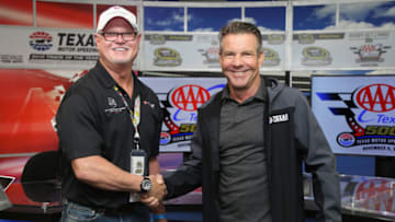 FORT WORTH, TX - NOVEMBER 06: Actor Dennis Quaid and former Tampa Bay Devil Rays relief pitcher Jim Morris attend a press conference with the ESPY award won for the film "The Rookie" prior to the NASCAR Sprint Cup Series AAA Texas 500 at Texas Motor Speedway on November 6, 2016 in Fort Worth, Texas. (Photo by Jerry Markland/Getty Images)