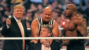 DETROIT - APRIL 1: WWE chairman Vince McMahon (C) prepares to have his head shaved by Donald Trump (L) and Bobby Lashley (R) while being held down by ''Stone Cold'' Steve Austin after losing a bet in the Battle of the Billionaires at the 2007 World Wrestling Entertainment's Wrestlemania at Ford Field on April 1, 2007 in Detroit, Michigan. Umaga was representing McMahon in the match when he lost to Bobby Lashley who was representing Trump. (Photo by Bill Pugliano/Getty Images)