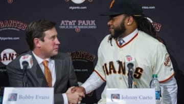 Dec 17, 2015; San Francisco, CA, USA; San Francisco senior vice president/general manager Bobby Evans shakes hand after the signing of pitcher Johnny Cueto at a press conference at AT&T Park. Mandatory Credit: John Hefti-USA TODAY Sports
