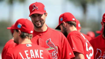 Feb 18, 2016; Jupiter, FL, USA; St. Louis Cardinals starting pitcher Adam Wainwright (50) talks with starting pitcher Mike Leake (8) before warm ups at Roger Dean Stadium. Mandatory Credit: Steve Mitchell-USA TODAY Sports