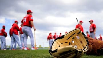 Feb 18, 2016; Jupiter, FL, USA; A general view of two MLB gloves on the practice field at Roger Dean Stadium. Mandatory Credit: Steve Mitchell-USA TODAY Sports