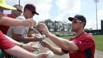 Mar 11, 2015; Lake Buena Vista, FL, USA; St. Louis Cardinals center fielder Randal Grichuk (15) signs autographs before a spring training baseball game against the Atlanta Braves at Champion Stadium. Mandatory Credit: Reinhold Matay-USA TODAY Sports