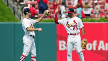 Jul 5, 2015; St. Louis, MO, USA; St. Louis Cardinals center fielder Thomas Pham (60) celebrates with left fielder Randal Grichuk (15) after defeating the San Diego Padres at Busch Stadium. The Cardinals won 3-1. Mandatory Credit: Jeff Curry-USA TODAY Sports