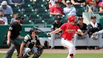 Mar 3, 2016; Jupiter, FL, USA; St. Louis Cardinals right fielder Brandon Moss (37) connects for a double against the Miami Marlins during a spring training game at Roger Dean Stadium. Mandatory Credit: Steve Mitchell-USA TODAY Sports