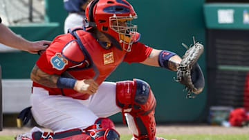 Mar 11, 2016; Jupiter, FL, USA; St. Louis Cardinals catcher Yadier Molina (4) catches against the Atlanta Braves during the game at Roger Dean StadiumThe Cardinals defeated the Braves 4-3. Mandatory Credit: Scott Rovak-USA TODAY Sports