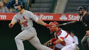 May 11, 2016; Anaheim, CA, USA; St. Louis Cardinals center fielder Randal Grichuk (15) hits an RBI single in the second inning of the game against the Los Angeles Angels at Angel Stadium of Anaheim. Mandatory Credit: Jayne Kamin-Oncea-USA TODAY Sports